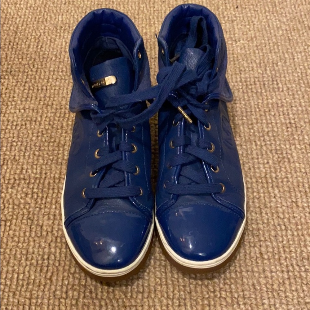 Blue high top sneakers from Michael Kors. Size 8M.